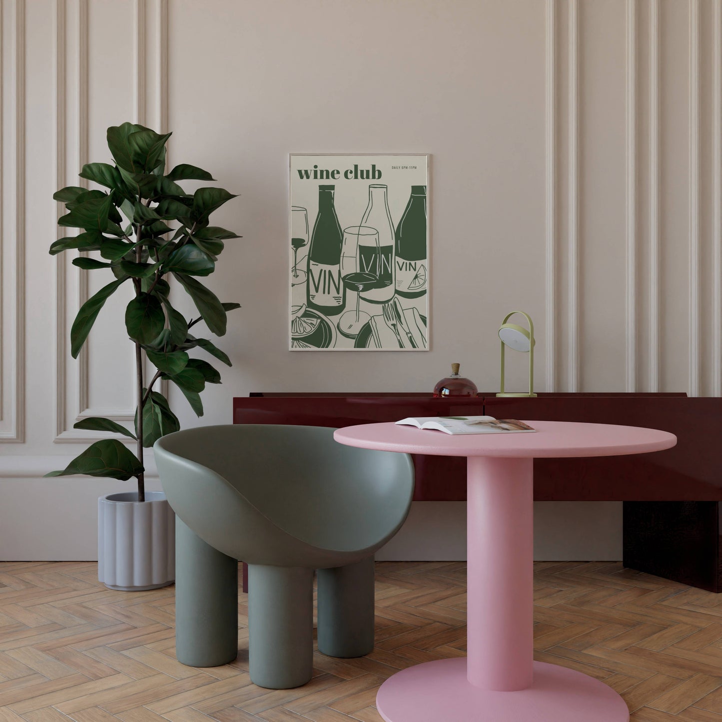 Modern interior with a pink table, gray chair, and plant against a wall with a 'wine club' poster.