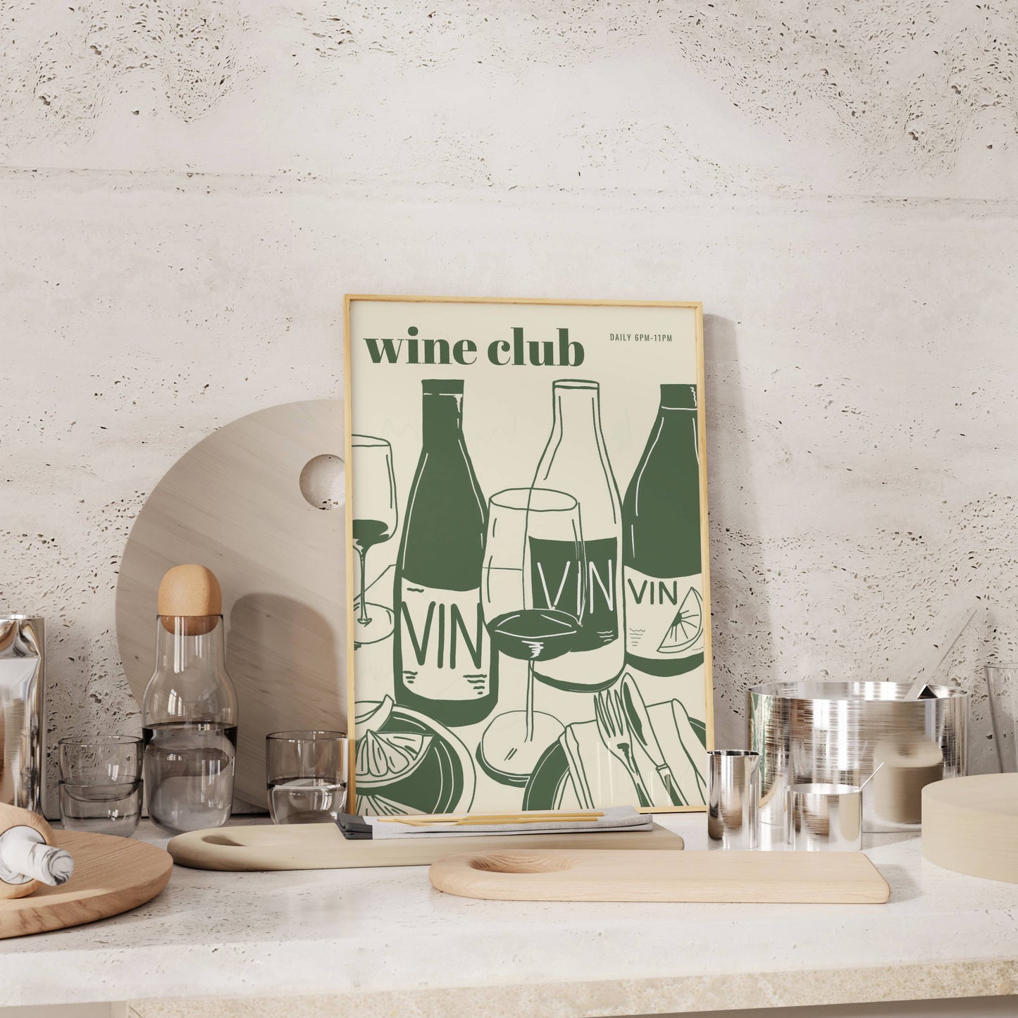 Framed wine bottle poster with wine club design citrus and bistro print on a kitchen counter.